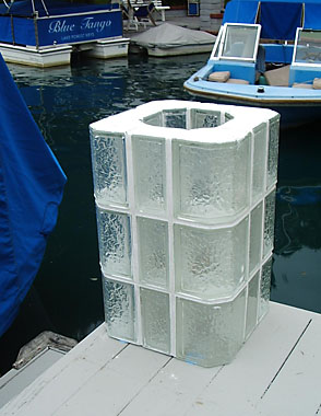 Glass block surrounded boat dock lamp.